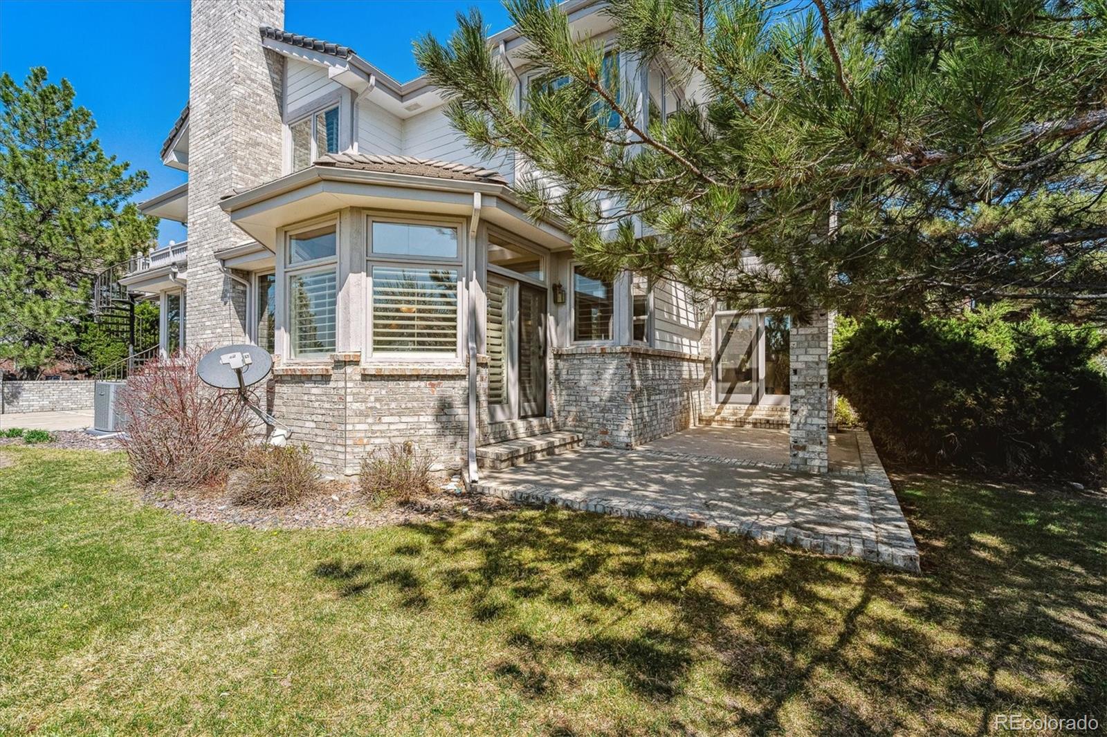 72 Falcon Hills Drive Highlands Ranch, CO 80126 - Photo 46 of 49 a view of house with yard