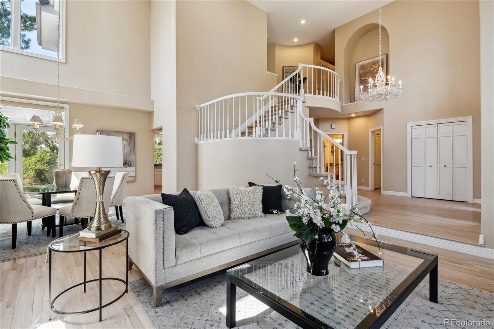 72 Falcon Hills Drive Highlands Ranch, CO 80126 - Photo 8 of 49 a living room with furniture and wooden floor