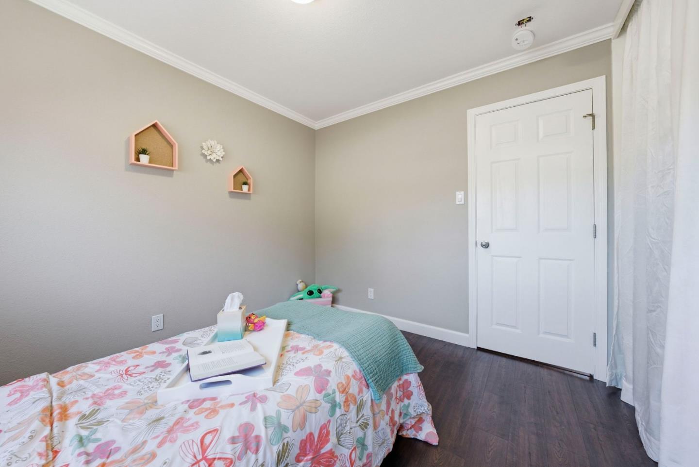 2793 Ruff Court Pinole, CA 94564 - Photo 23 of 53 a bedroom with a bed and wooden floor
