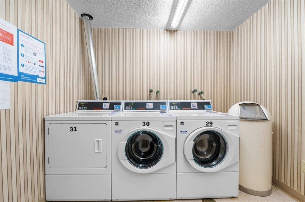 1004 Paradise Road, Unit PHJ Swampscott, MA 01907 - Photo 23 of 29 a utility room with dryer and washer