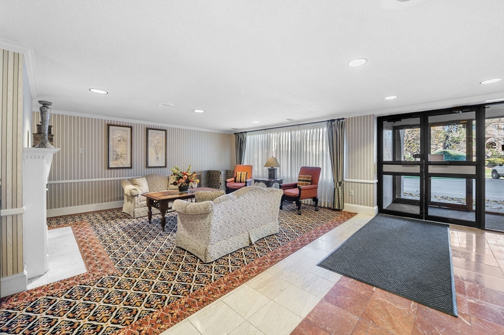 1004 Paradise Road, Unit PHJ Swampscott, MA 01907 - Photo 3 of 29 a living room with furniture and a window