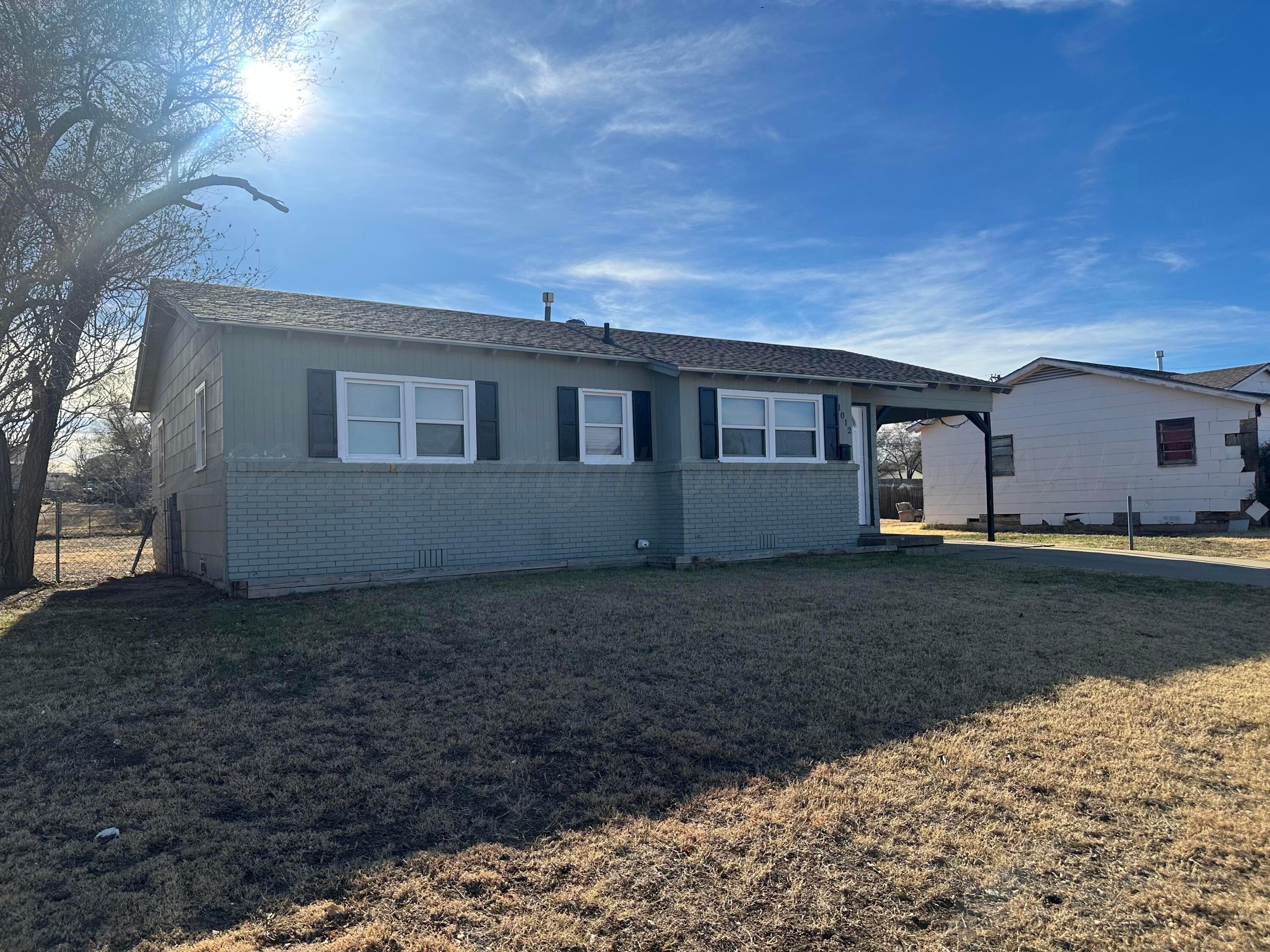 1012 Harper Street Amarillo, TX 79107 - Photo 16 of 22 a house view with a backyard space