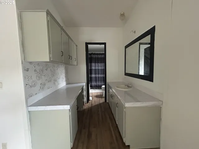 a bathroom with a sink and a bathtub