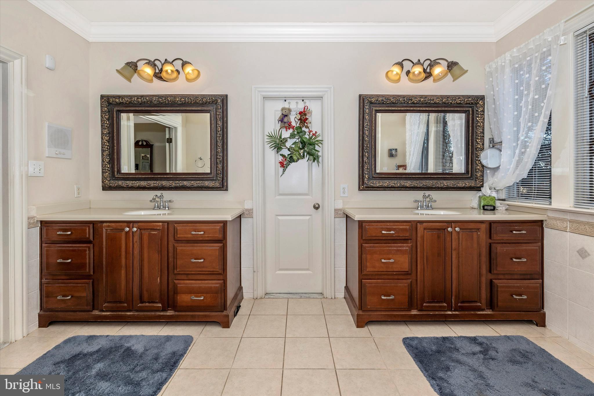 9455 Longs Mill Road Rocky Ridge, MD 21778 - Photo 29 of 70 dual cherry vanities in main level master bathroom