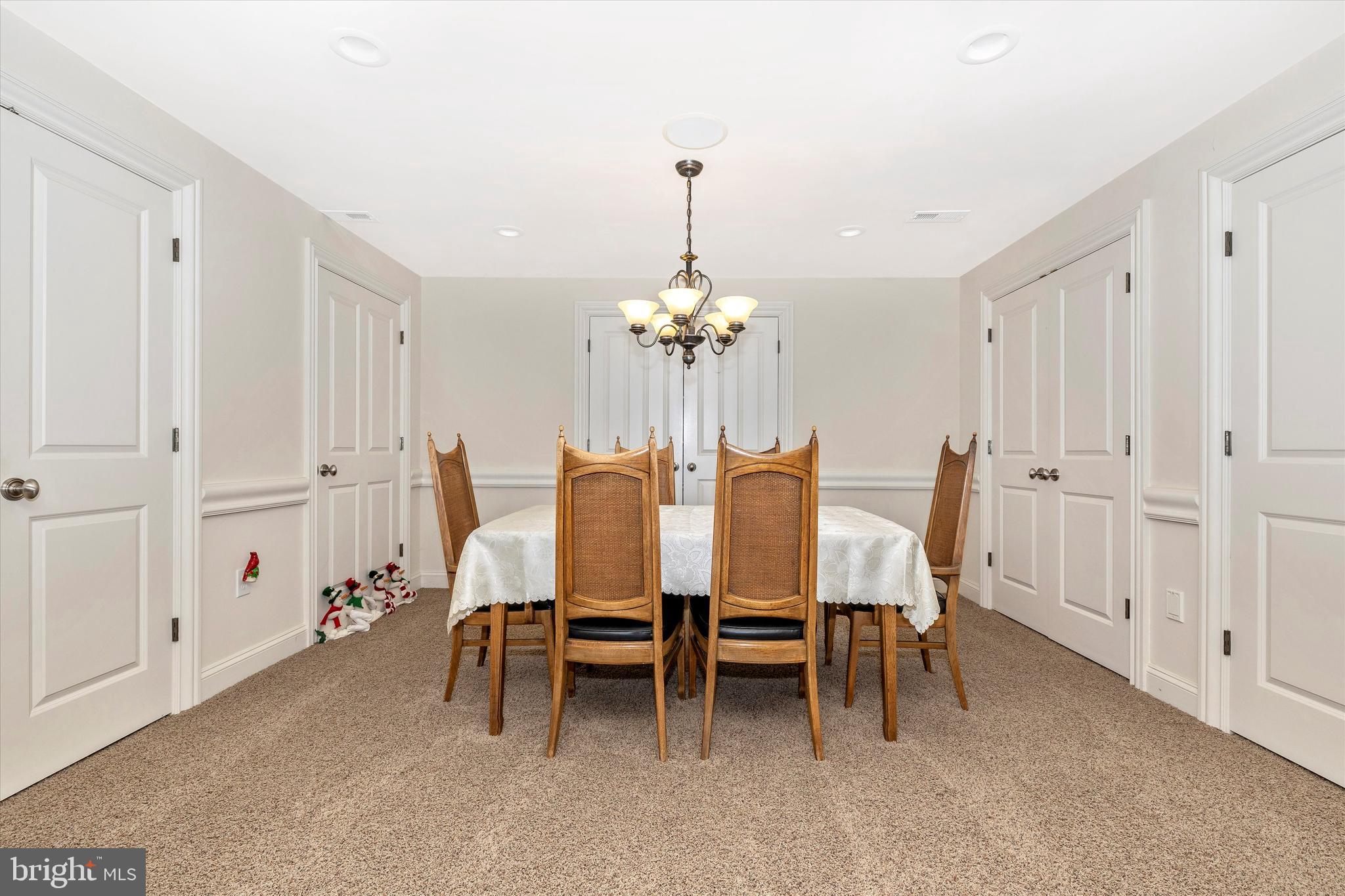 9455 Longs Mill Road Rocky Ridge, MD 21778 - Photo 43 of 70 Board game room with 5 sets of closets