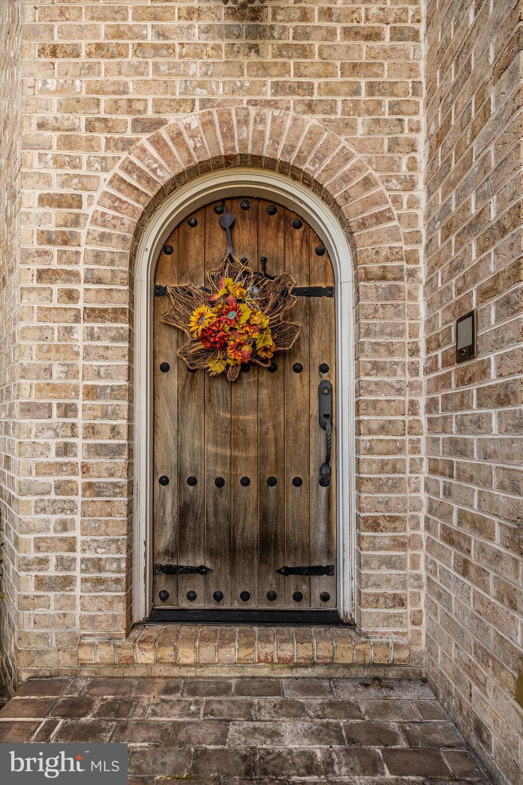 9455 Longs Mill Road Rocky Ridge, MD 21778 - Photo 50 of 70 Beautiful archway & wood plank door at main entry