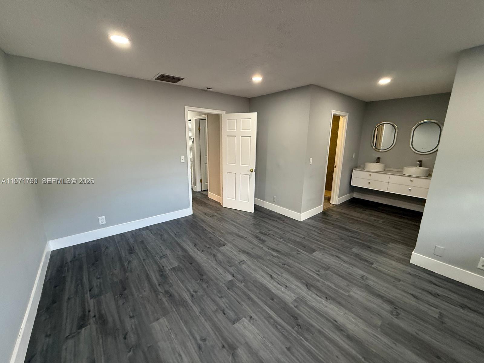 2700 North 34th Avenue, Unit I Hollywood, FL 33021 - Photo 22 of 35 a view of a livingroom with furniture and wooden floor