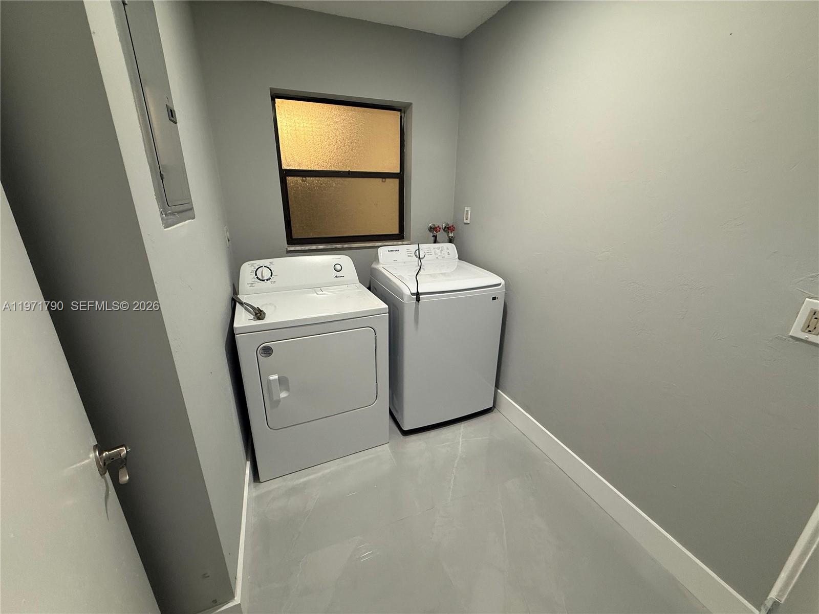 2700 North 34th Avenue, Unit I Hollywood, FL 33021 - Photo 32 of 35 a utility room with dryer and washer