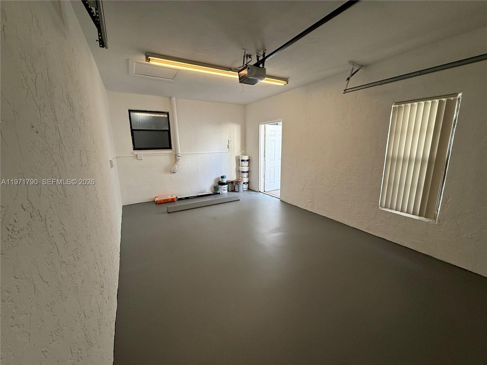 2700 North 34th Avenue, Unit I Hollywood, FL 33021 - Photo 35 of 35 a view of a livingroom with wooden floor and a window
