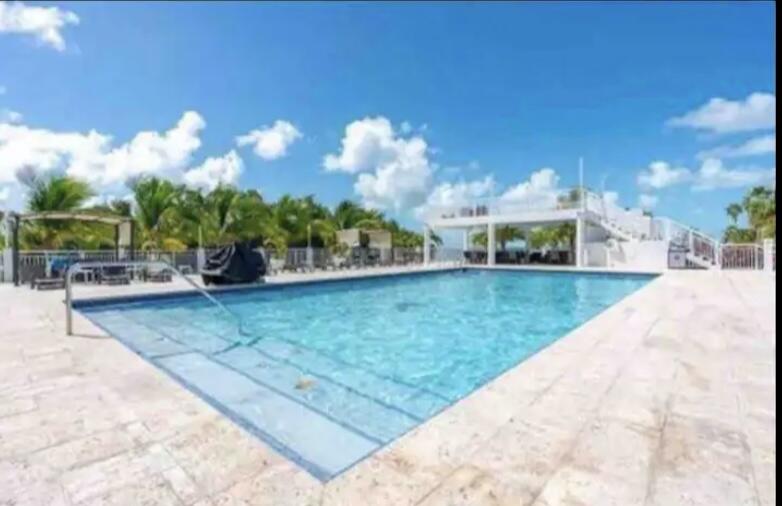 325 Calusa Street, Unit 478 Key Largo, FL 33037 - Photo 19 of 38 a view of a backyard