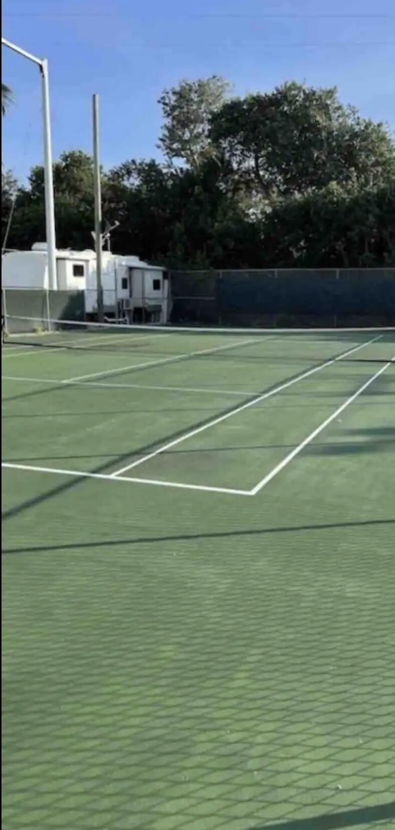 325 Calusa Street, Unit 478 Key Largo, FL 33037 - Photo 20 of 38 a view of a tennis court