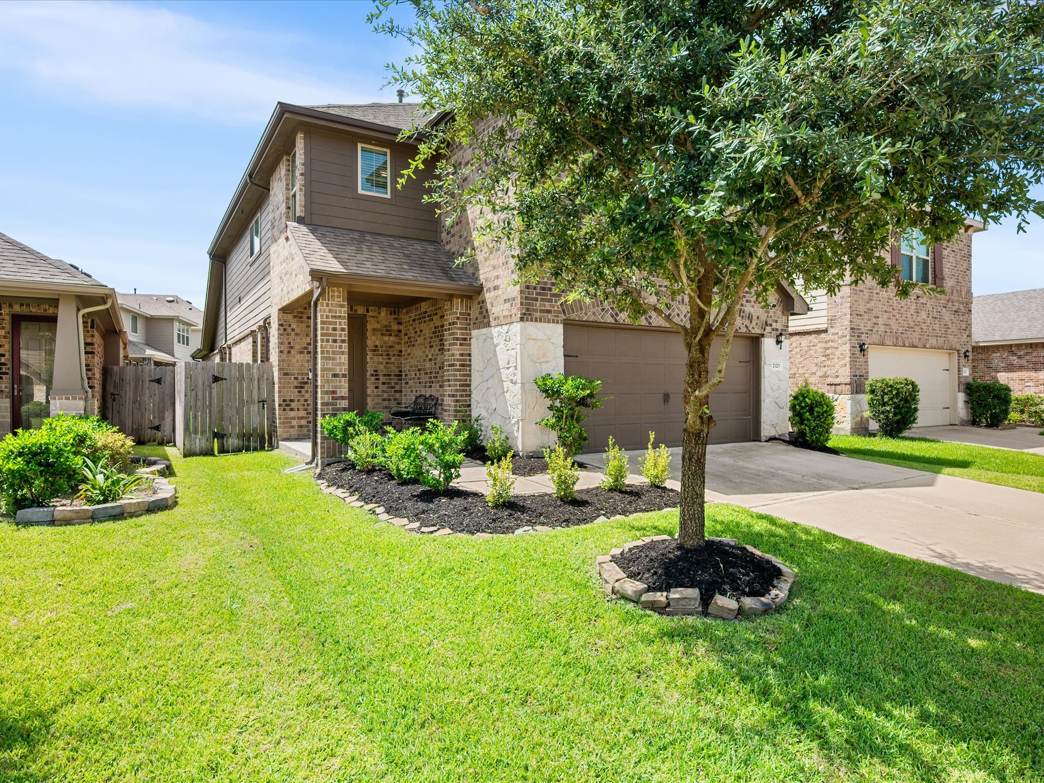 7123 Poppyseed Trail Spring, TX 77379 - Photo 2 of 30 Thoughtful exterior improvements, including gutters added in 2023 and fresh sod installed in 2025, add to the home's curb appeal and everyday enjoyment.