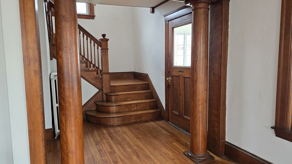 336 Burncoat Street Worcester, MA 01606 - Photo 19 of 40 a view of entryway and hall with wooden floor