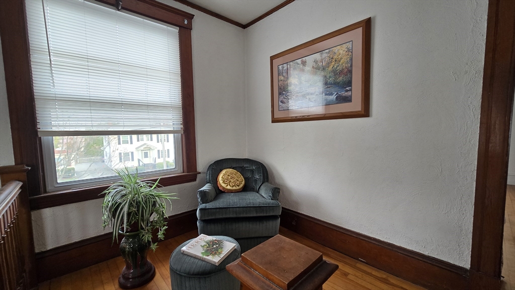 336 Burncoat Street Worcester, MA 01606 - Photo 27 of 40 a living room with furniture and window