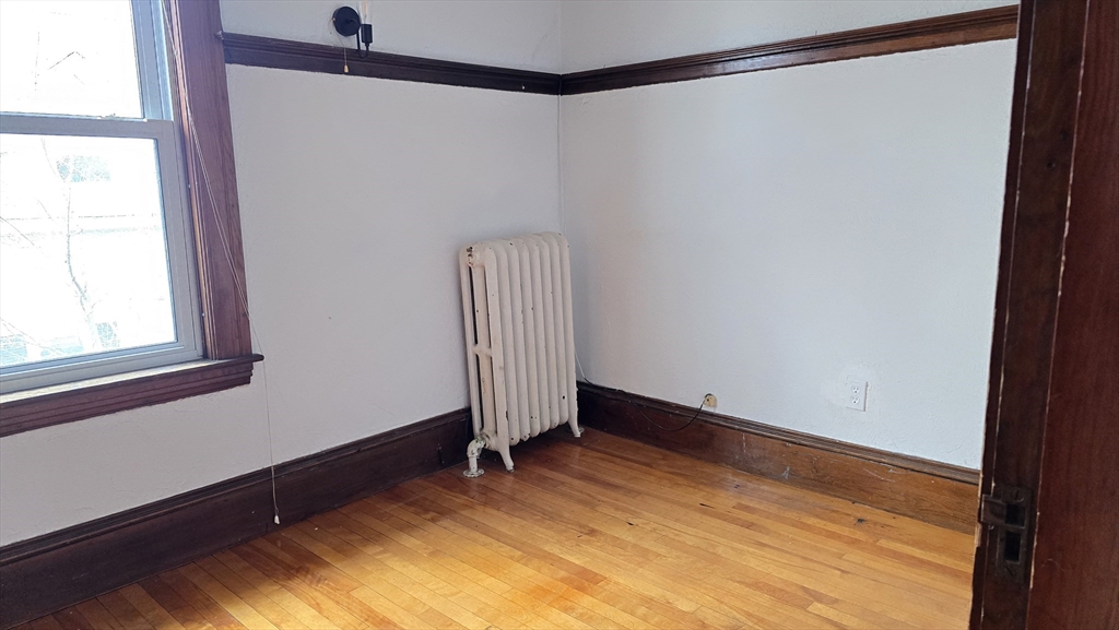 336 Burncoat Street Worcester, MA 01606 - Photo 28 of 40 a view of an empty room and window