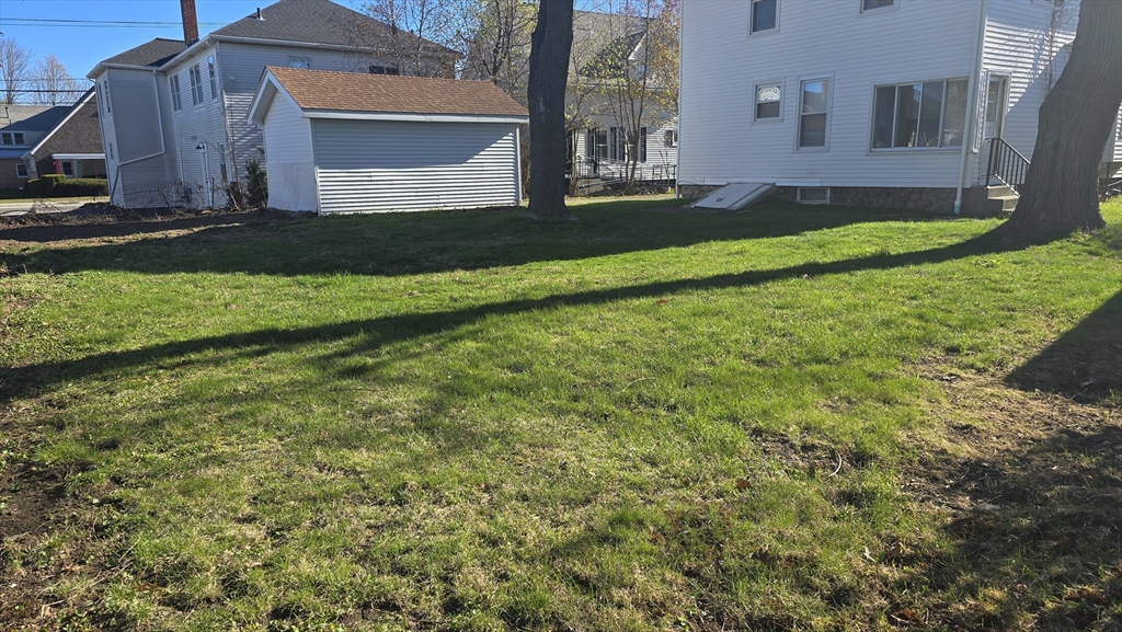 336 Burncoat Street Worcester, MA 01606 - Photo 40 of 40 a front view of a house with a garden