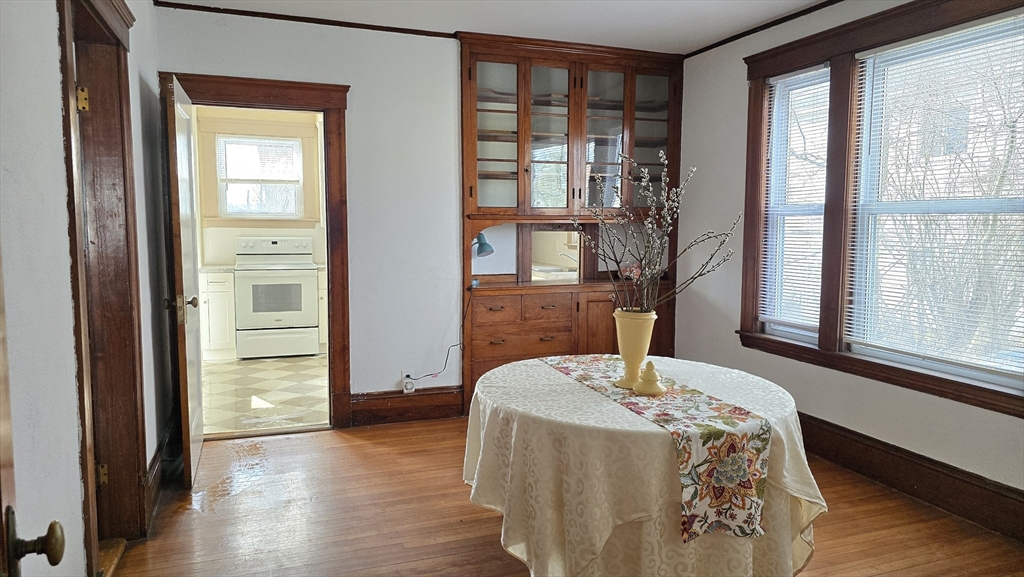 336 Burncoat Street Worcester, MA 01606 - Photo 9 of 40 a bedroom with a bed and a window