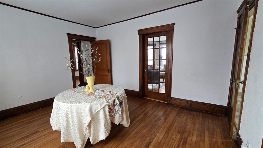 336 Burncoat Street Worcester, MA 01606 - Photo 10 of 40 a dining room with furniture and wooden floor