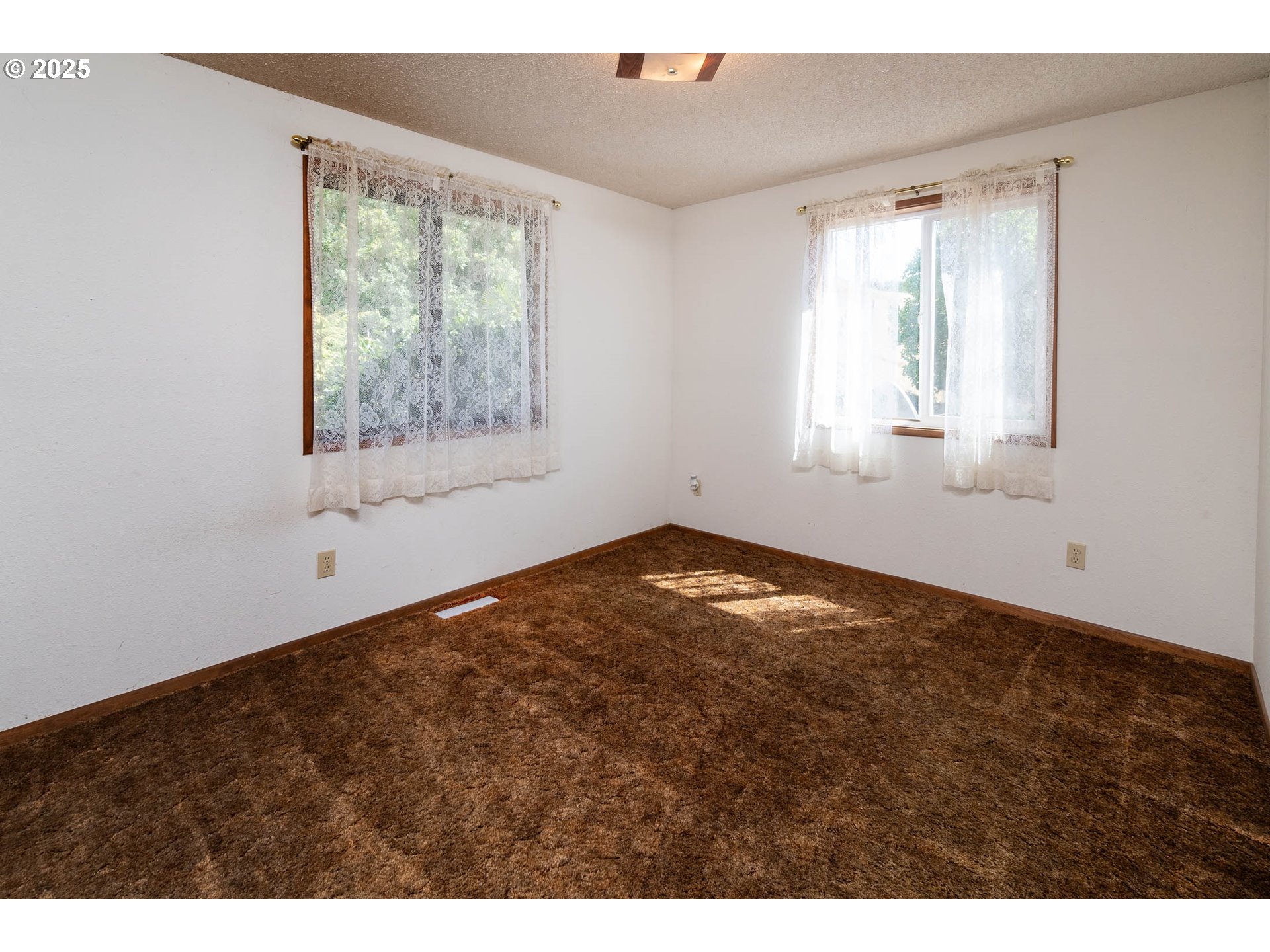 92433 Ward Creek Lane Myrtle Point, OR 97458 - Photo 14 of 38 a view of empty room with window