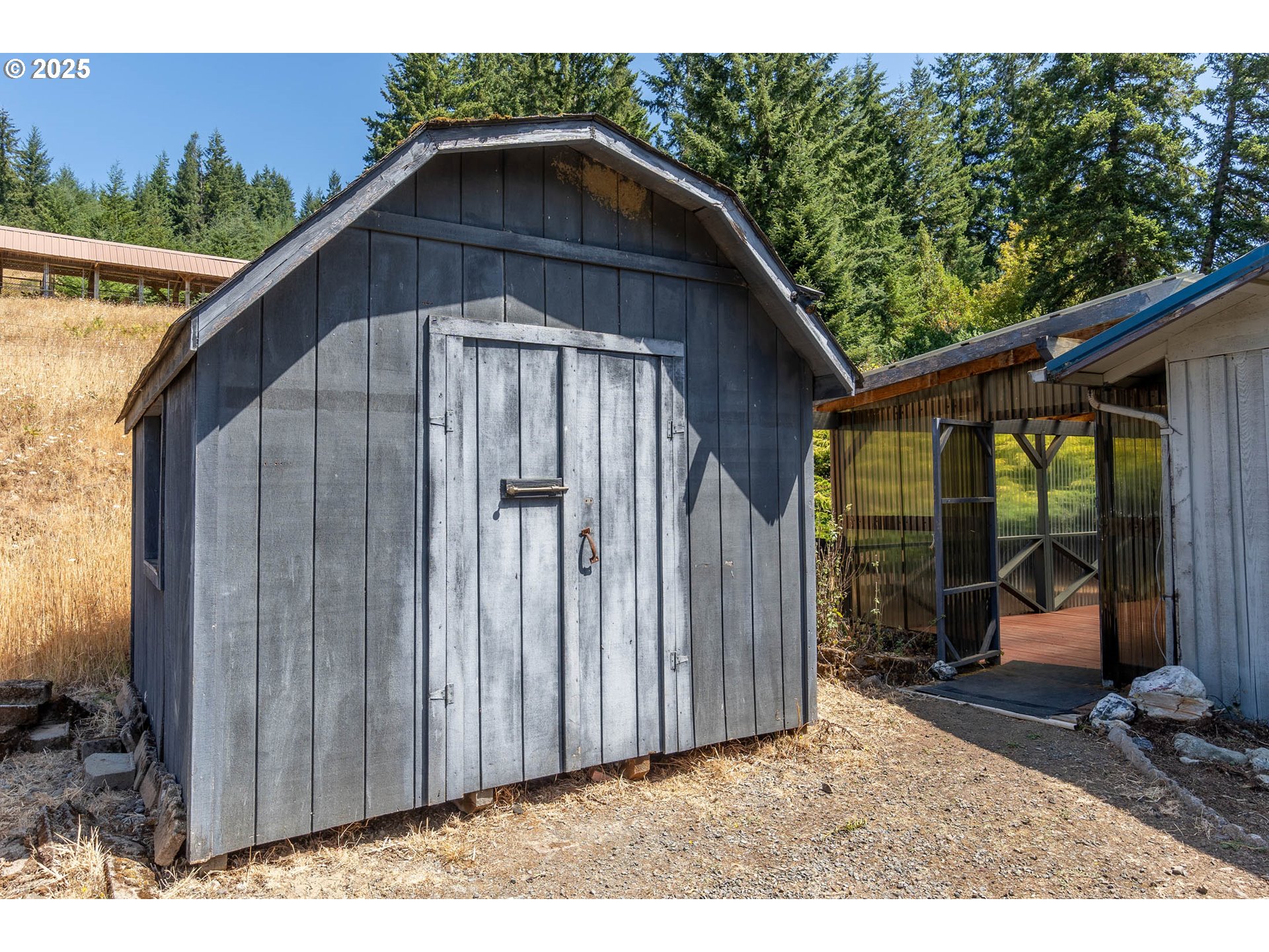92433 Ward Creek Lane Myrtle Point, OR 97458 - Photo 18 of 38 a backyard of a house with seating space