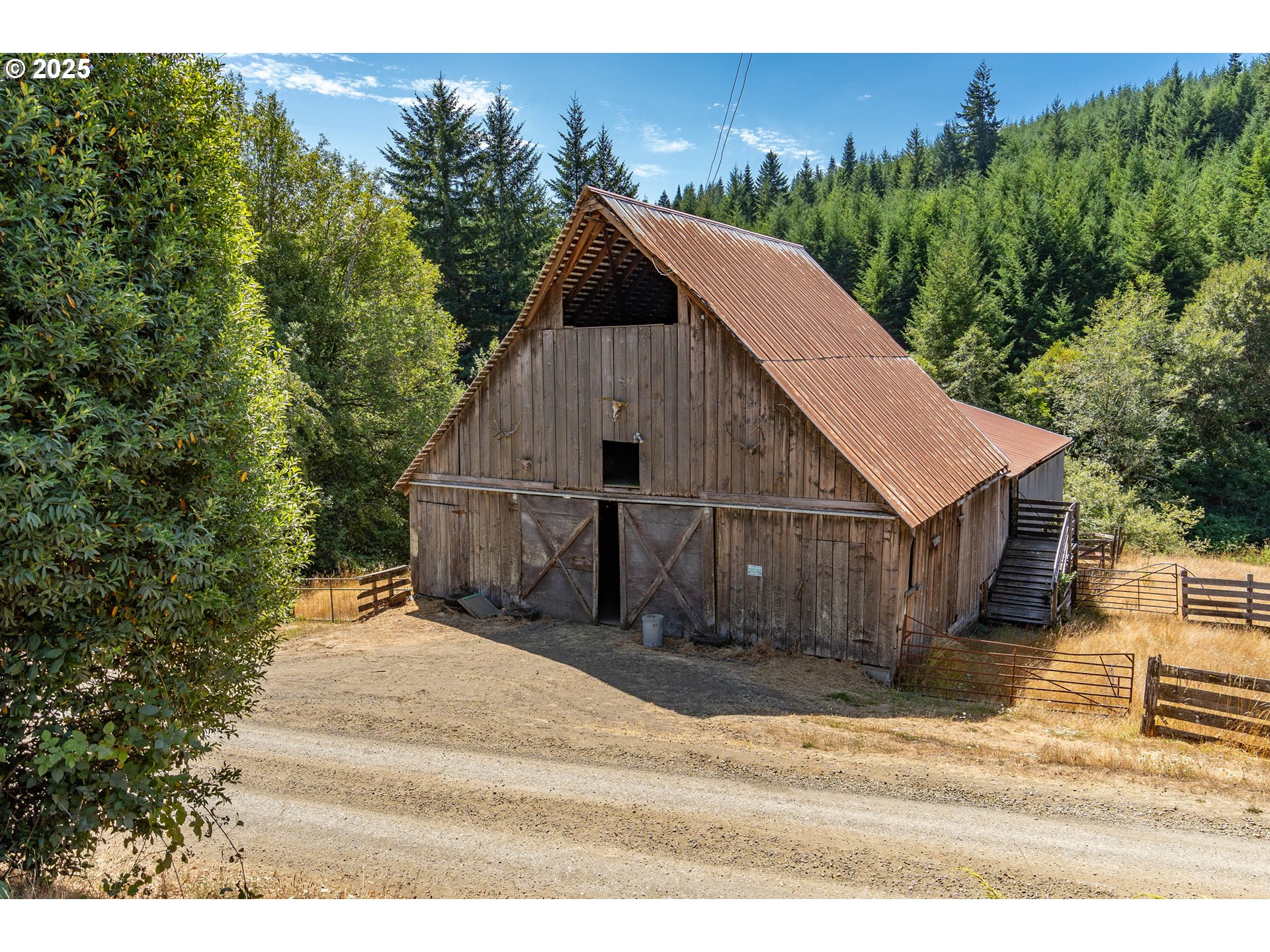 92433 Ward Creek Lane Myrtle Point, OR 97458 - Photo 22 of 38 a view of a house with a yard