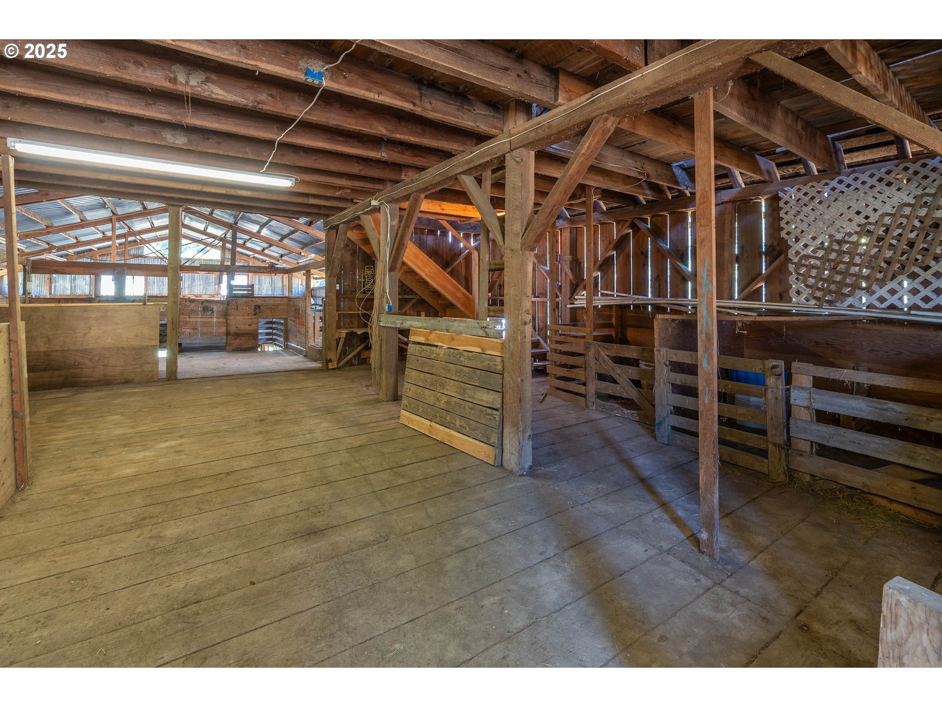 92433 Ward Creek Lane Myrtle Point, OR 97458 - Photo 23 of 38 a view of an empty room with wooden floor