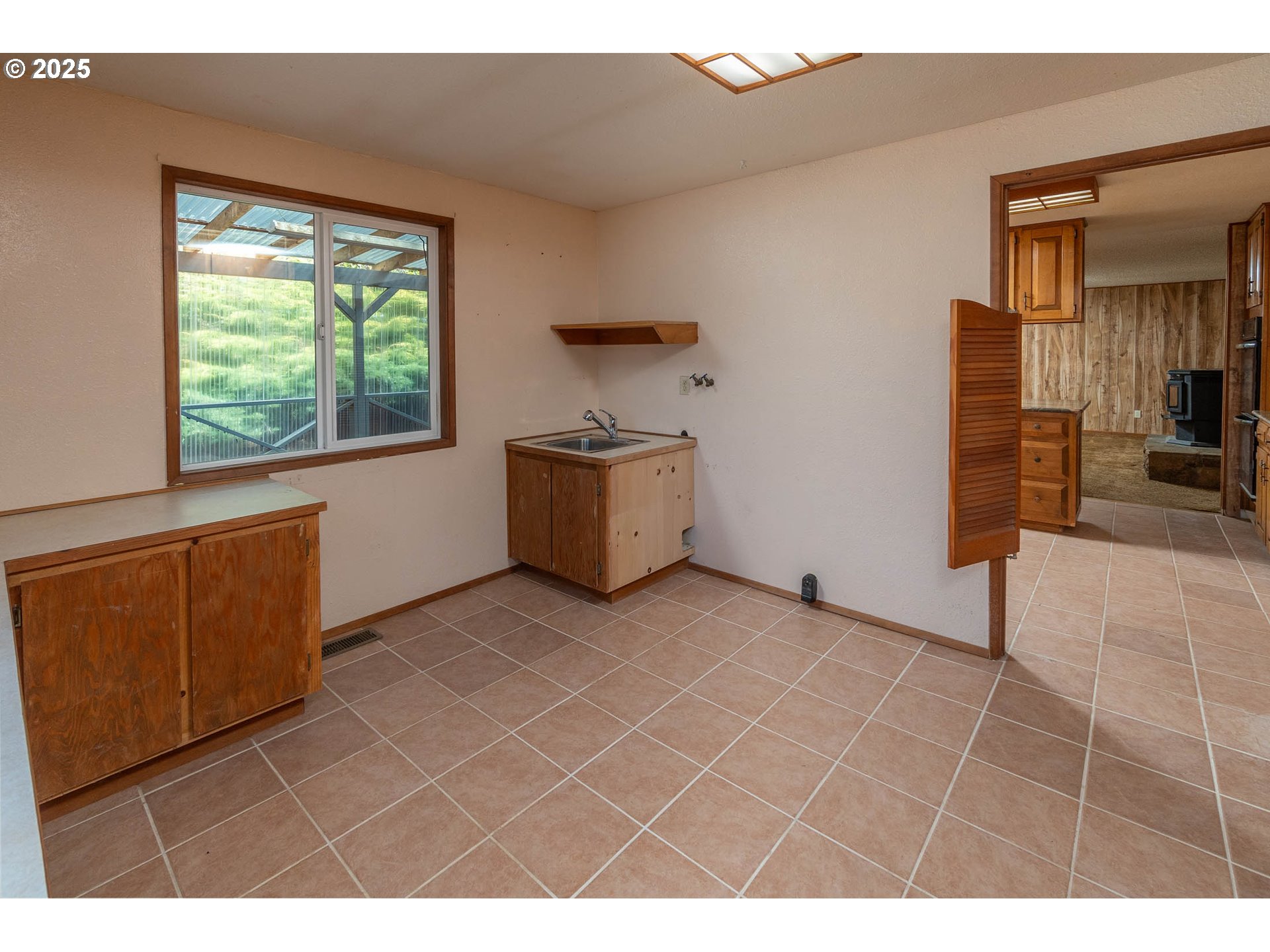 92433 Ward Creek Lane Myrtle Point, OR 97458 - Photo 9 of 38 a view of an empty room with a window