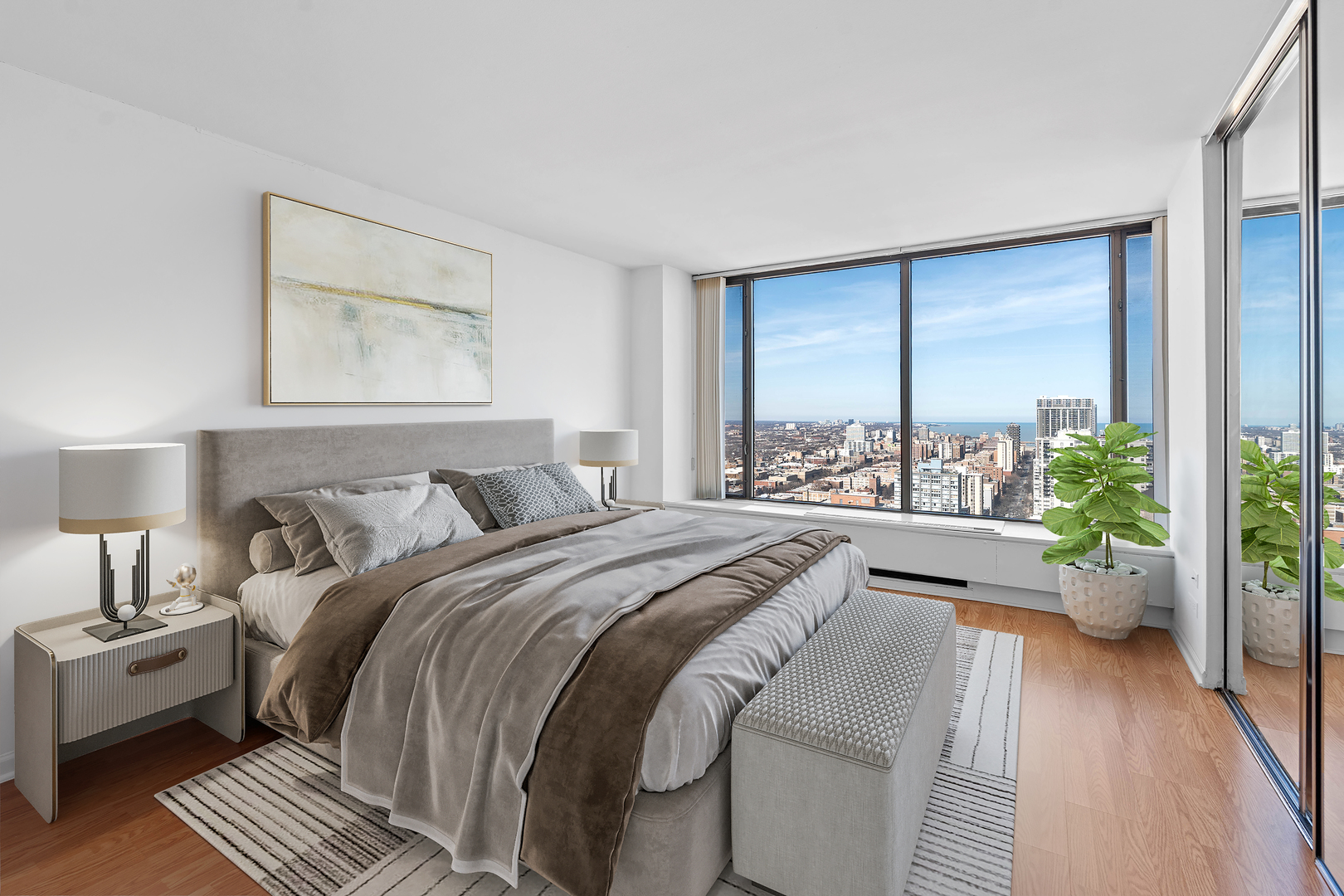 5455 North Sheridan Road, Unit 3611 Chicago, IL 60640 - Photo 5 of 18 a bed room with a bed and a large window