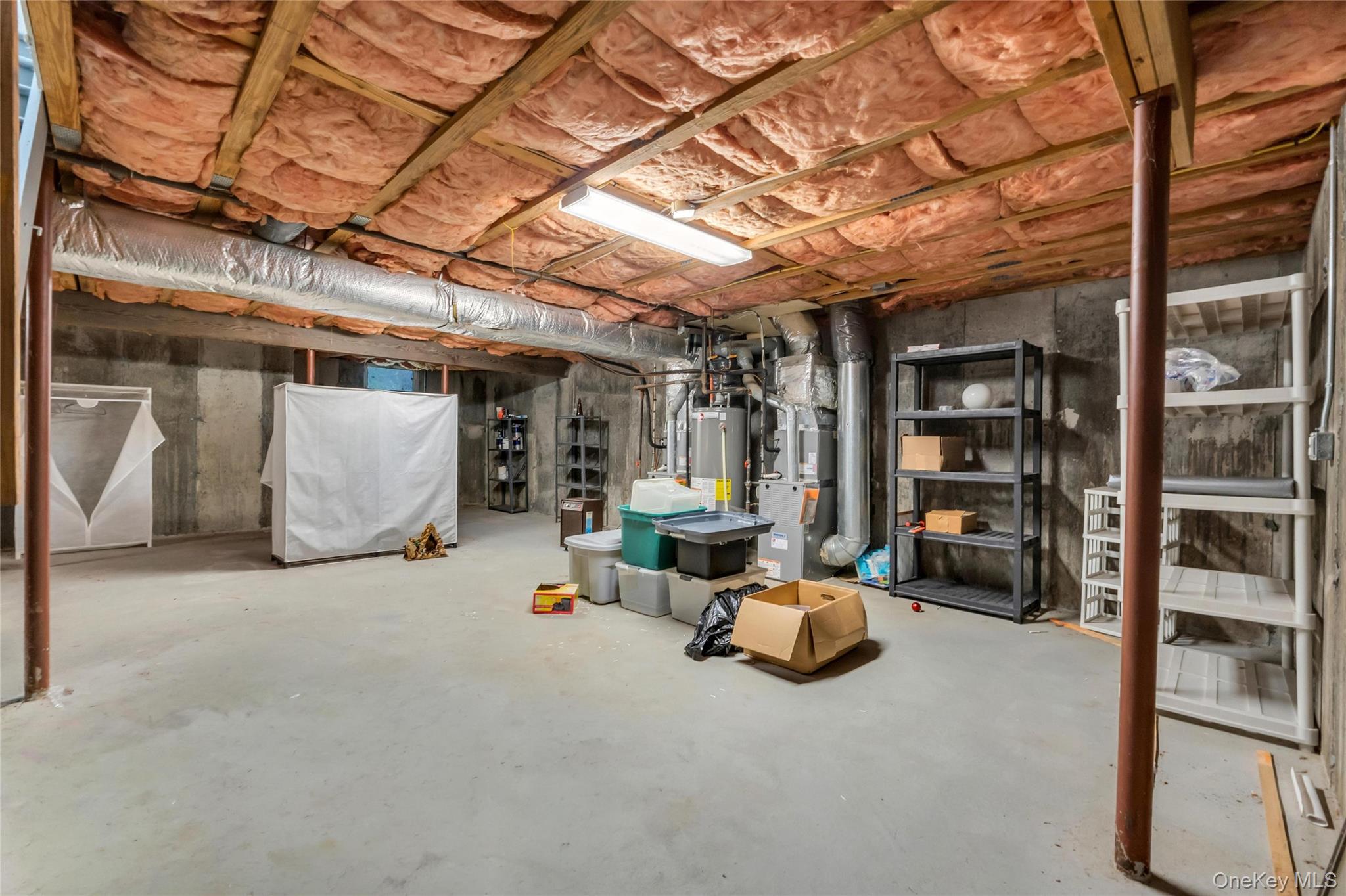 22 Kettle Hole Road Manorville, NY 11949 - Photo 30 of 39 Unfinished basement ready for finishing or plenty of storage