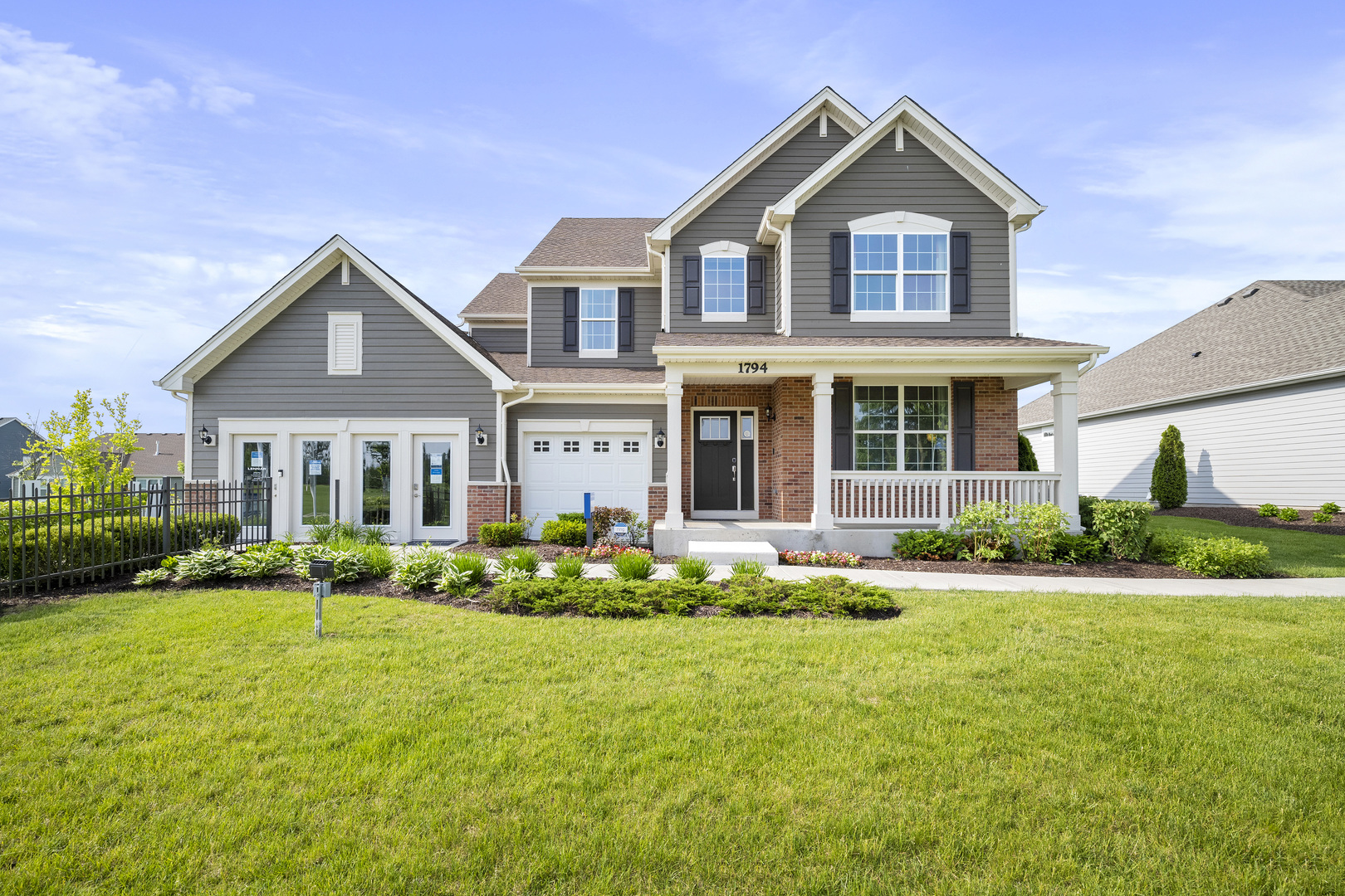 3664 Edelweiss Road Elgin, IL 60124 - Photo 1 of 31 a front view of a house with a yard and plants