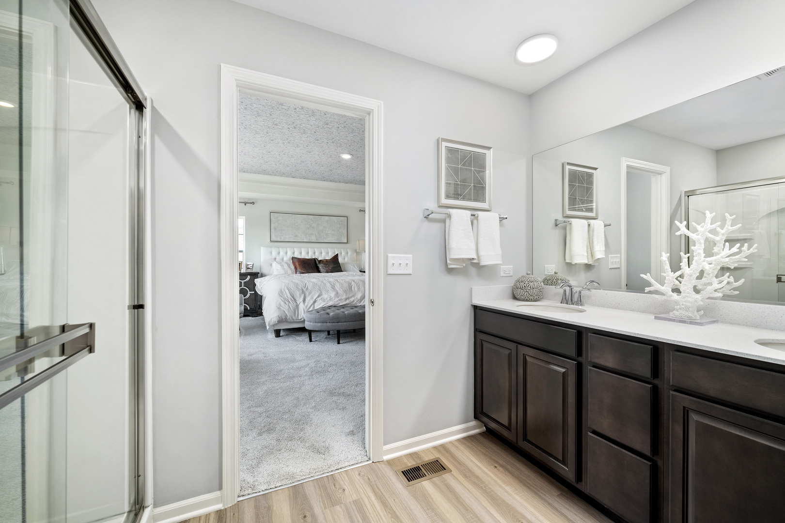 3664 Edelweiss Road Elgin, IL 60124 - Photo 26 of 31 a en suite bathroom with a sink and a mirror