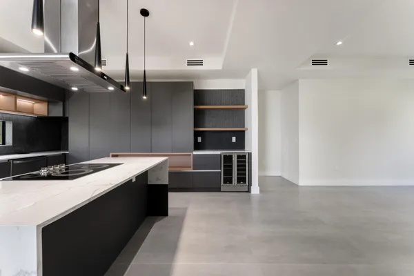 a view of an entryway with kitchen