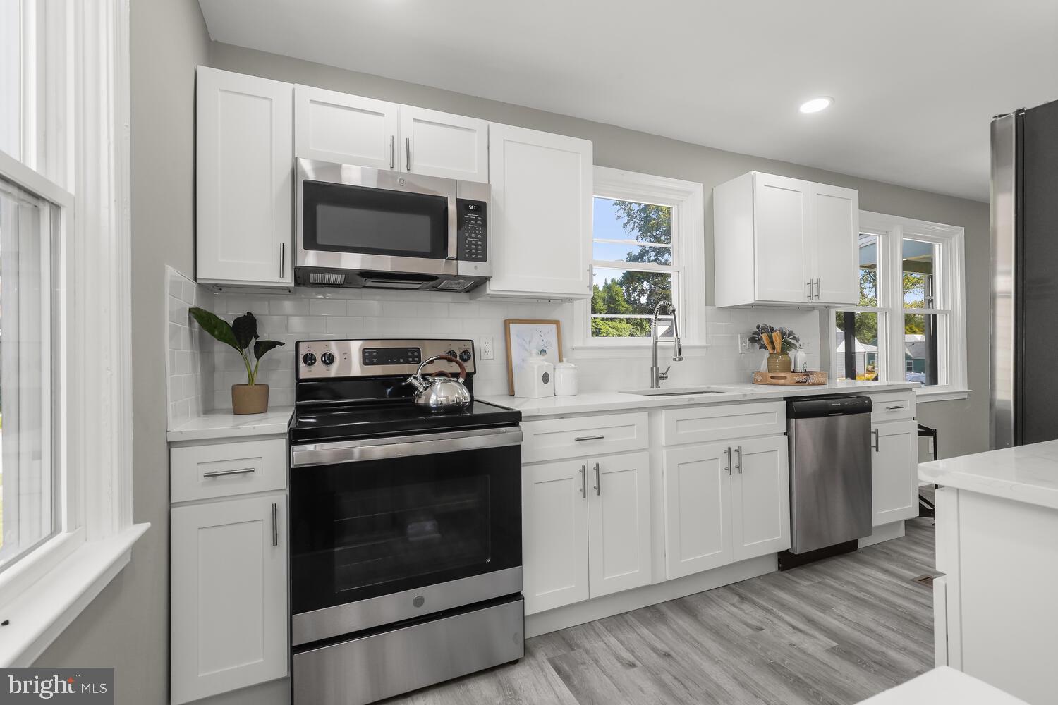 1815 Wendover Road Parkville, MD 21234 - Photo 12 of 45 a kitchen with a stove and a sink