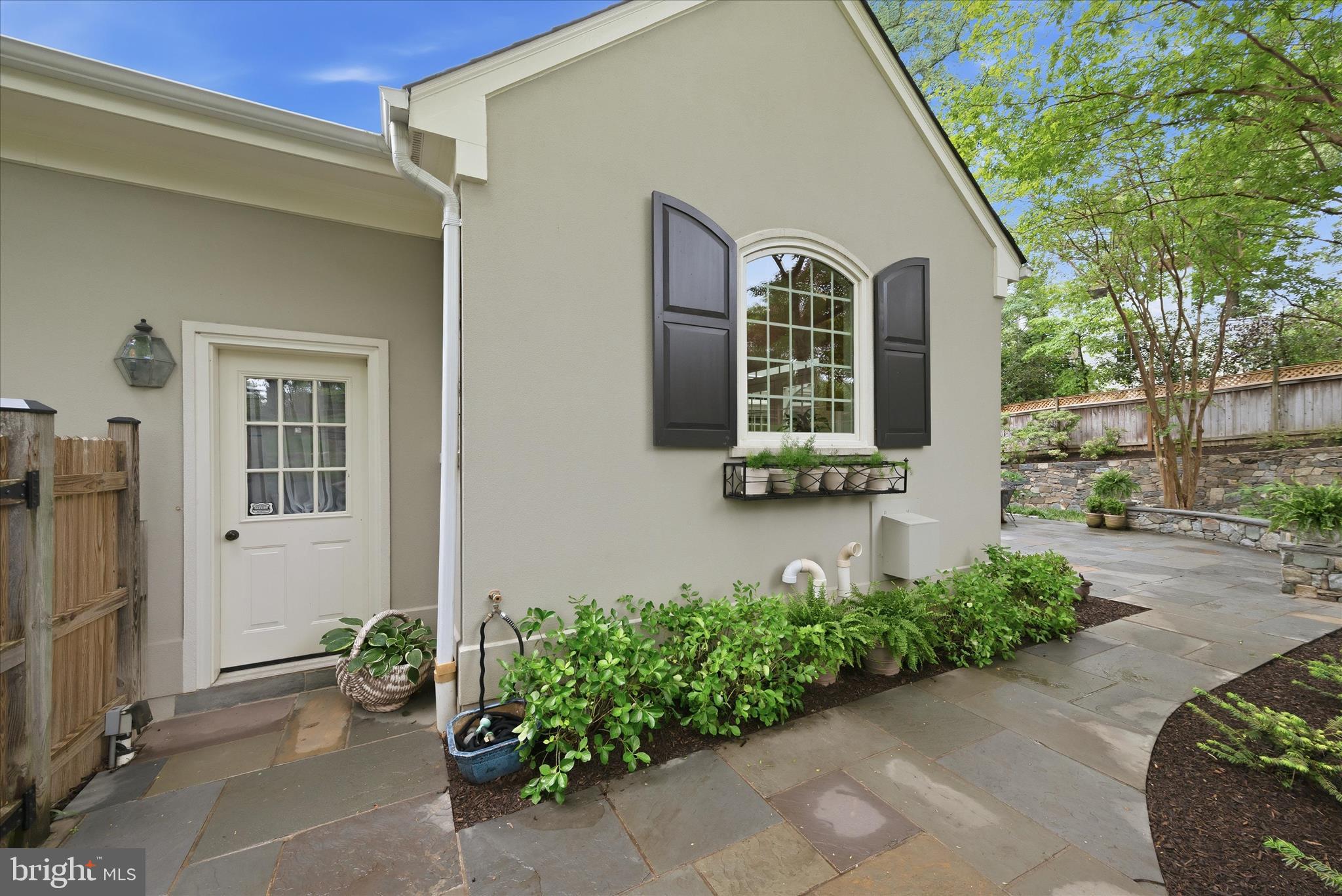 3824 Military Road Arlington, VA 22207 - Photo 48 of 54 a front view of a house with garden