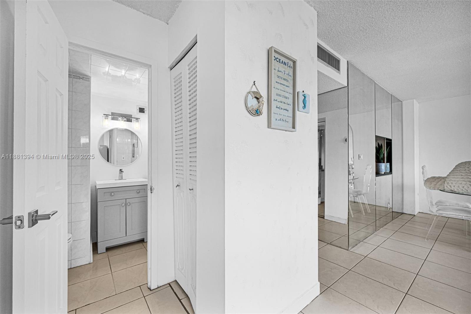 2100 Sans Souci Boulevard, Unit A509 North Miami, FL 33181 - Photo 29 of 44 a en suite bathroom with a shower