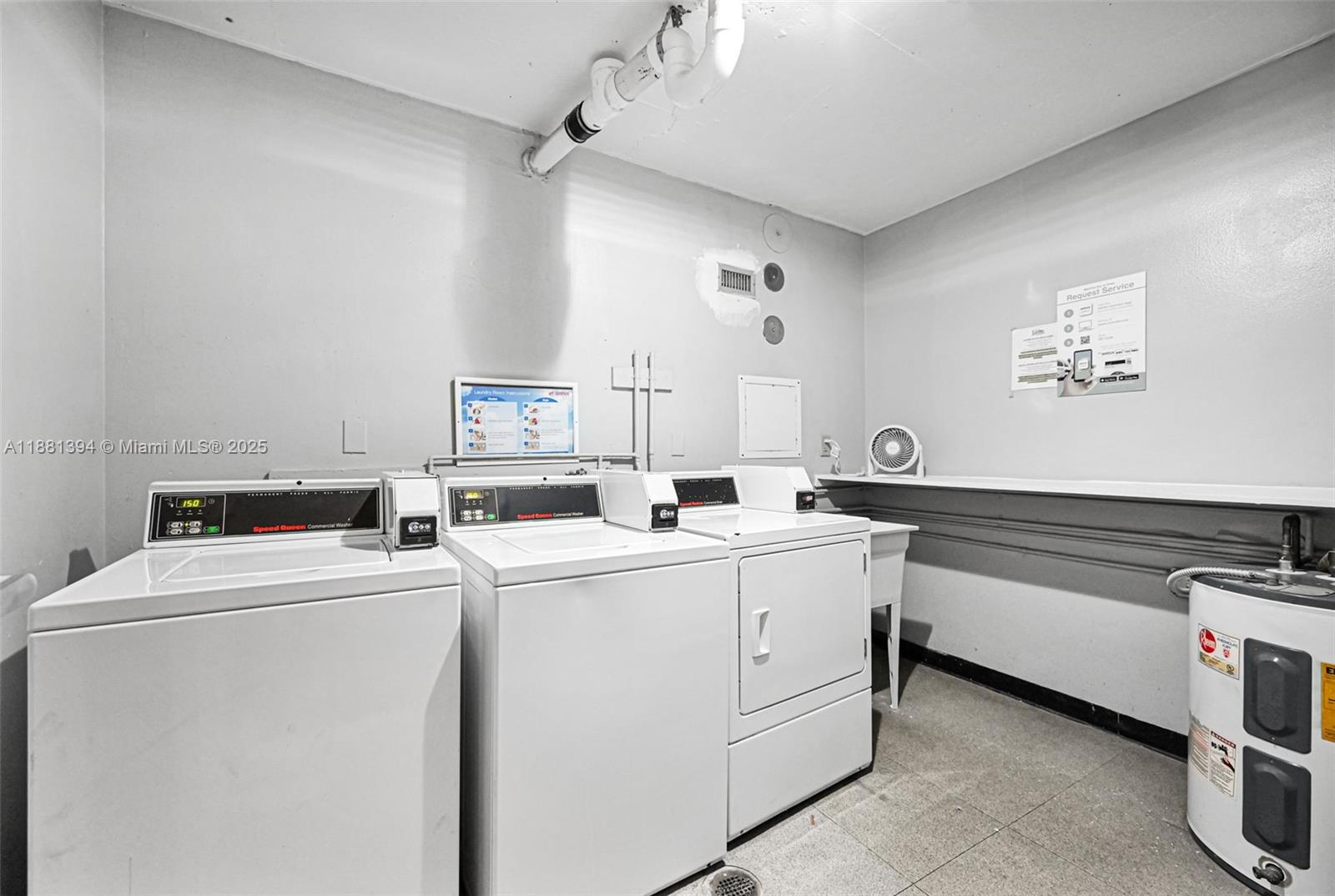 2100 Sans Souci Boulevard, Unit A509 North Miami, FL 33181 - Photo 31 of 44 a utility room with dryer and washer