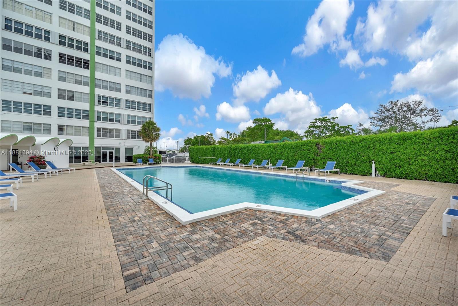 2100 Sans Souci Boulevard, Unit A509 North Miami, FL 33181 - Photo 32 of 44 a view of a swimming pool and outdoor space
