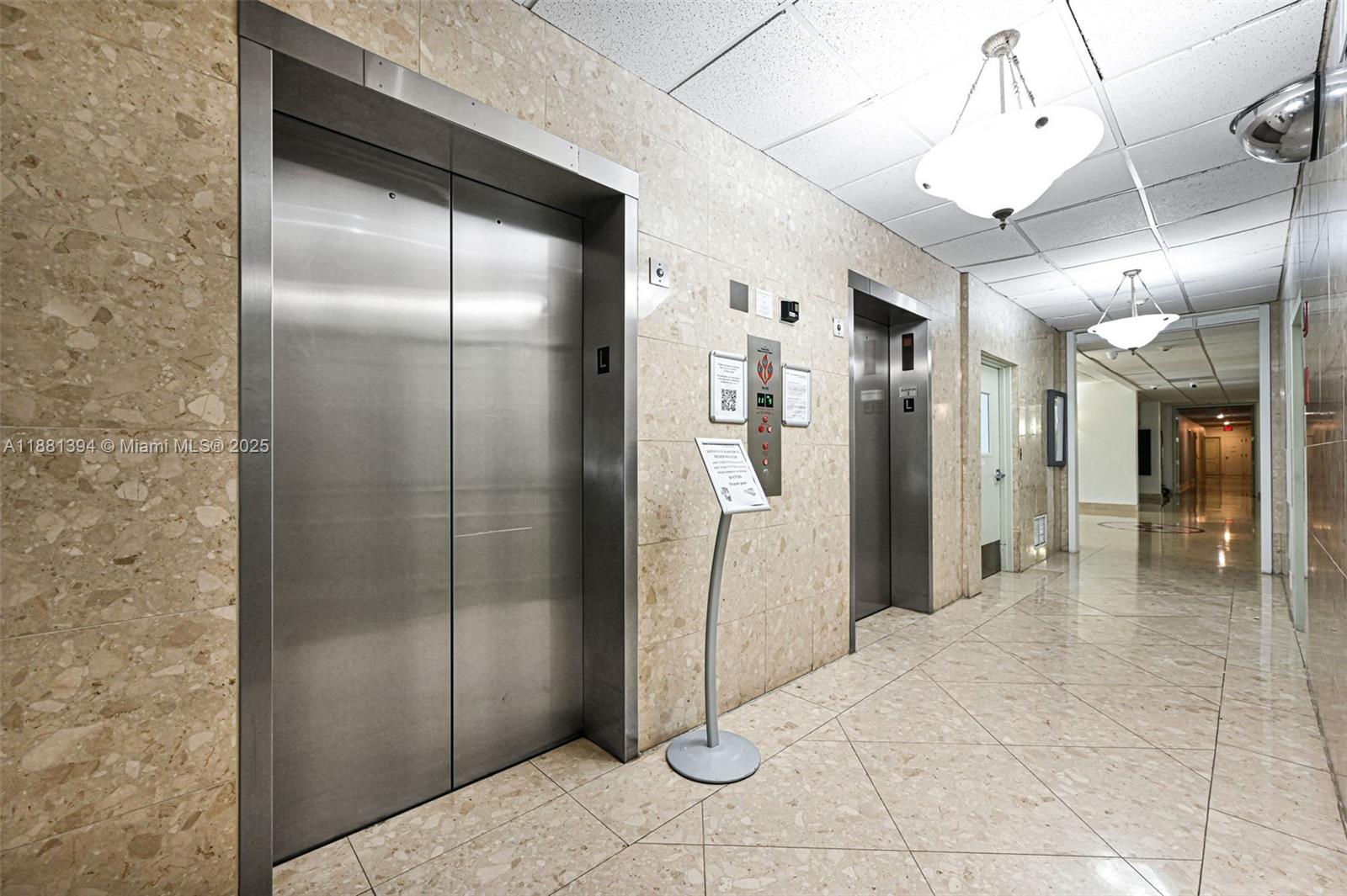 2100 Sans Souci Boulevard, Unit A509 North Miami, FL 33181 - Photo 44 of 44 a bathroom with a shower and closet