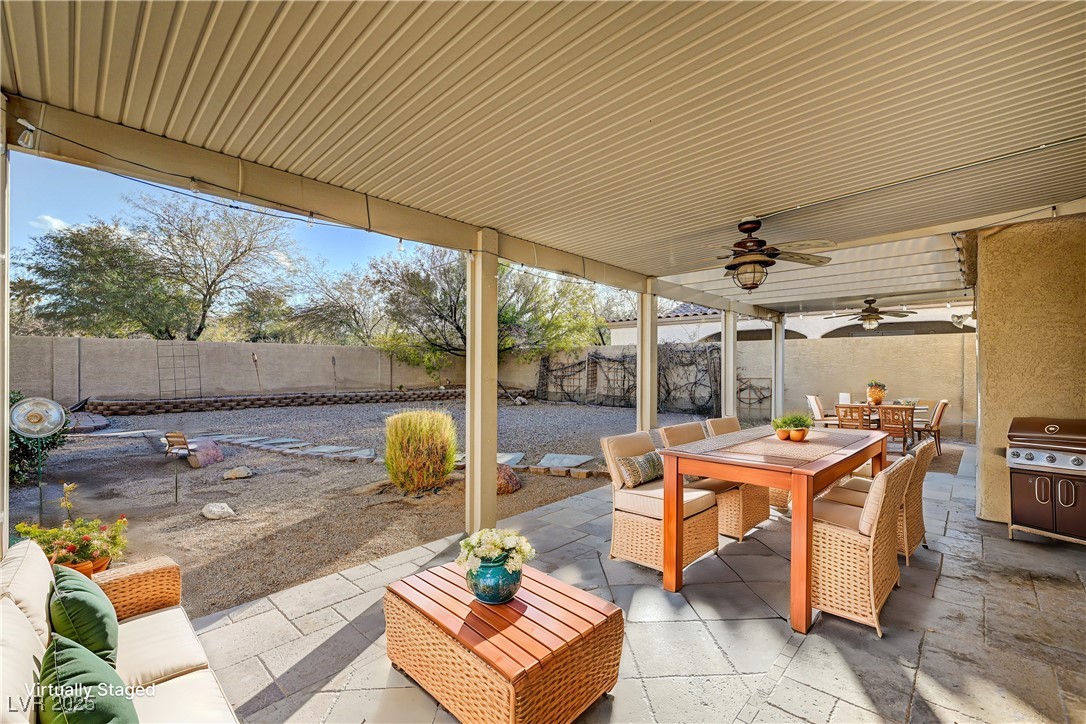 991 Ridge Path Avenue Henderson, NV 89015 - Photo 17 of 24 View of patio with outdoor dining space, area for