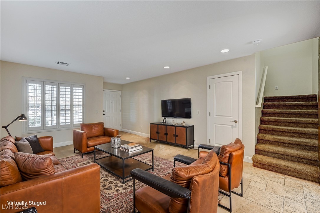 991 Ridge Path Avenue Henderson, NV 89015 - Photo 4 of 24 Living area featuring stone tile floors, recessed