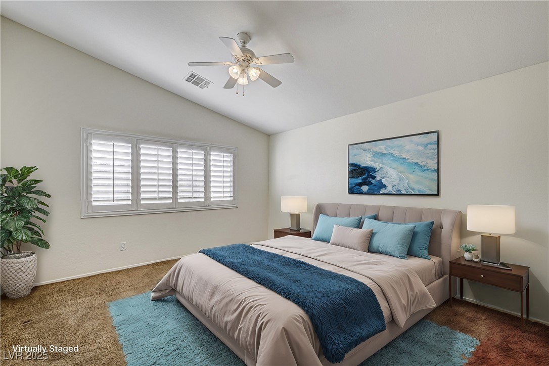 991 Ridge Path Avenue Henderson, NV 89015 - Photo 9 of 24 Bedroom featuring lofted ceiling, carpet floors, c