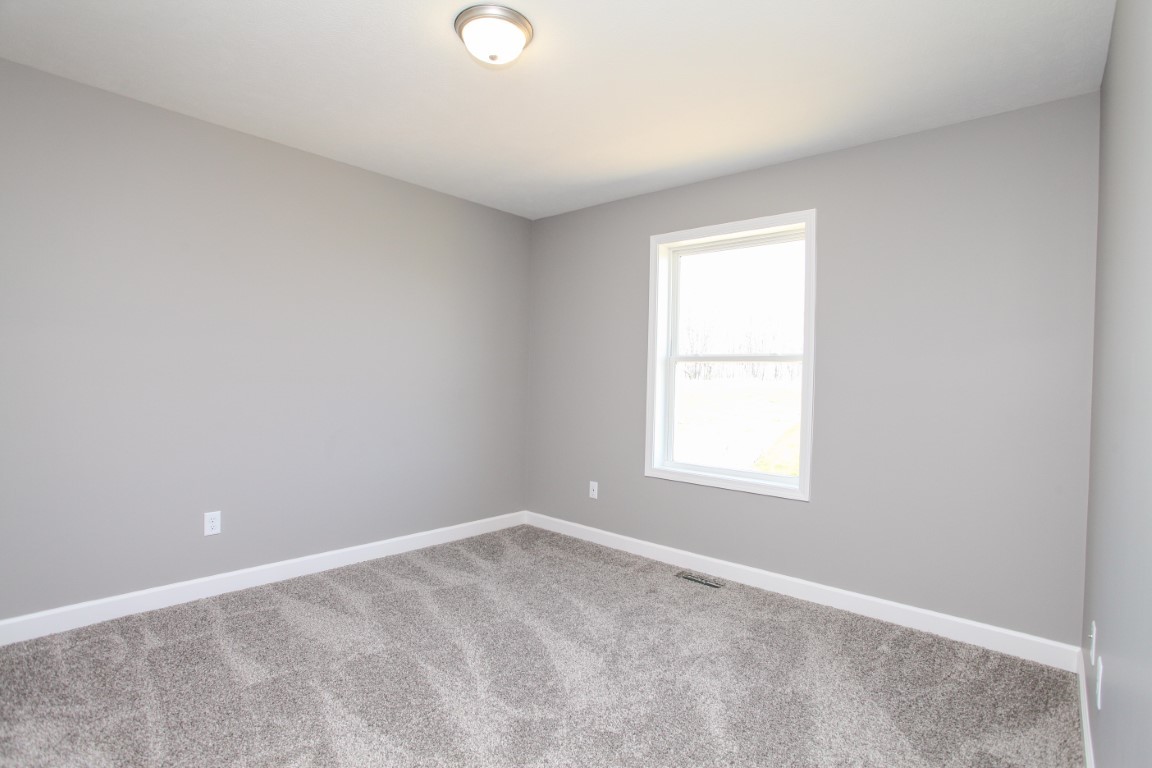 2238 Heather Ridge Drive Normal, IL 61761 - Photo 13 of 26 an empty room with a window