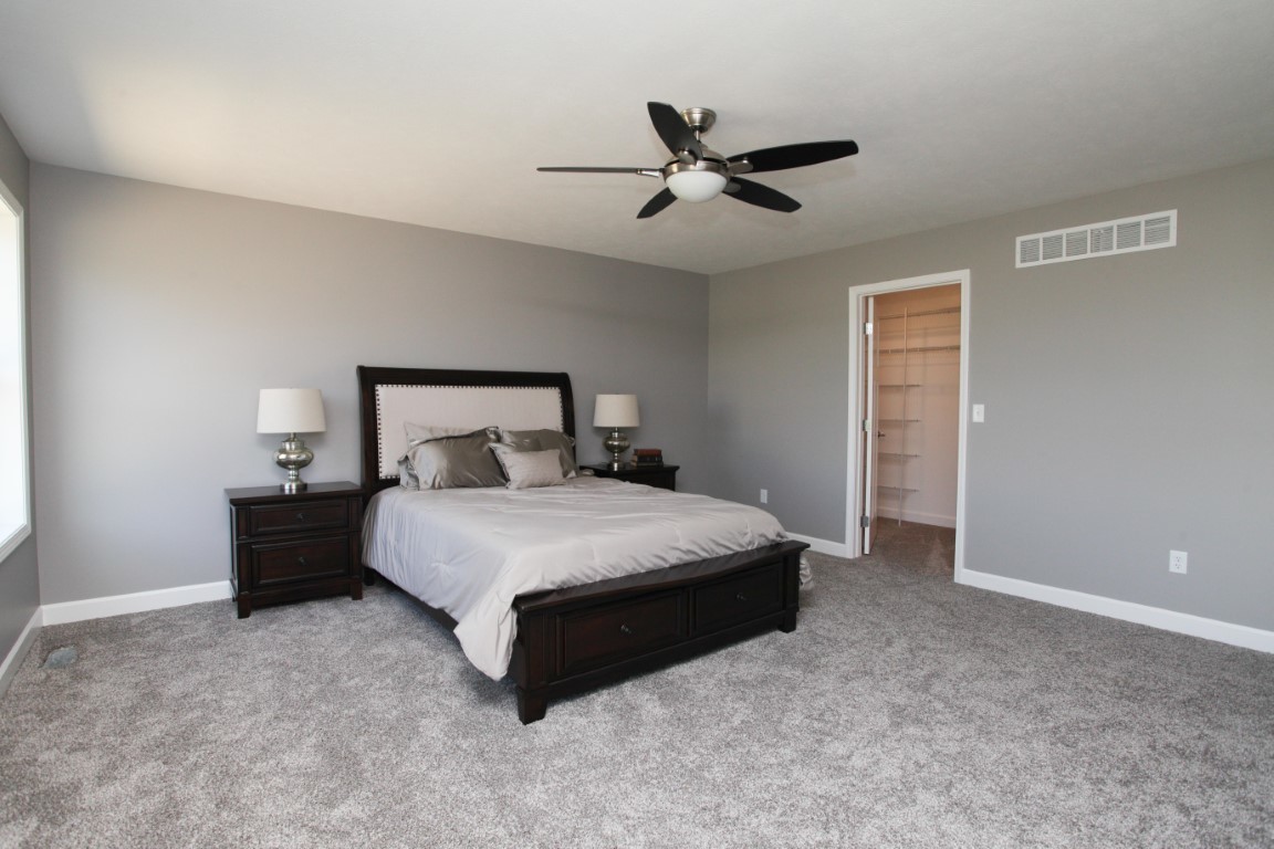 2238 Heather Ridge Drive Normal, IL 61761 - Photo 17 of 26 a bedroom with a bed and window
