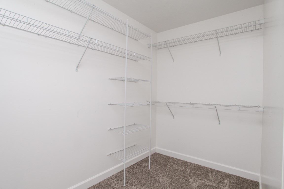 2238 Heather Ridge Drive Normal, IL 61761 - Photo 19 of 26 a view of a room with racks on the wall
