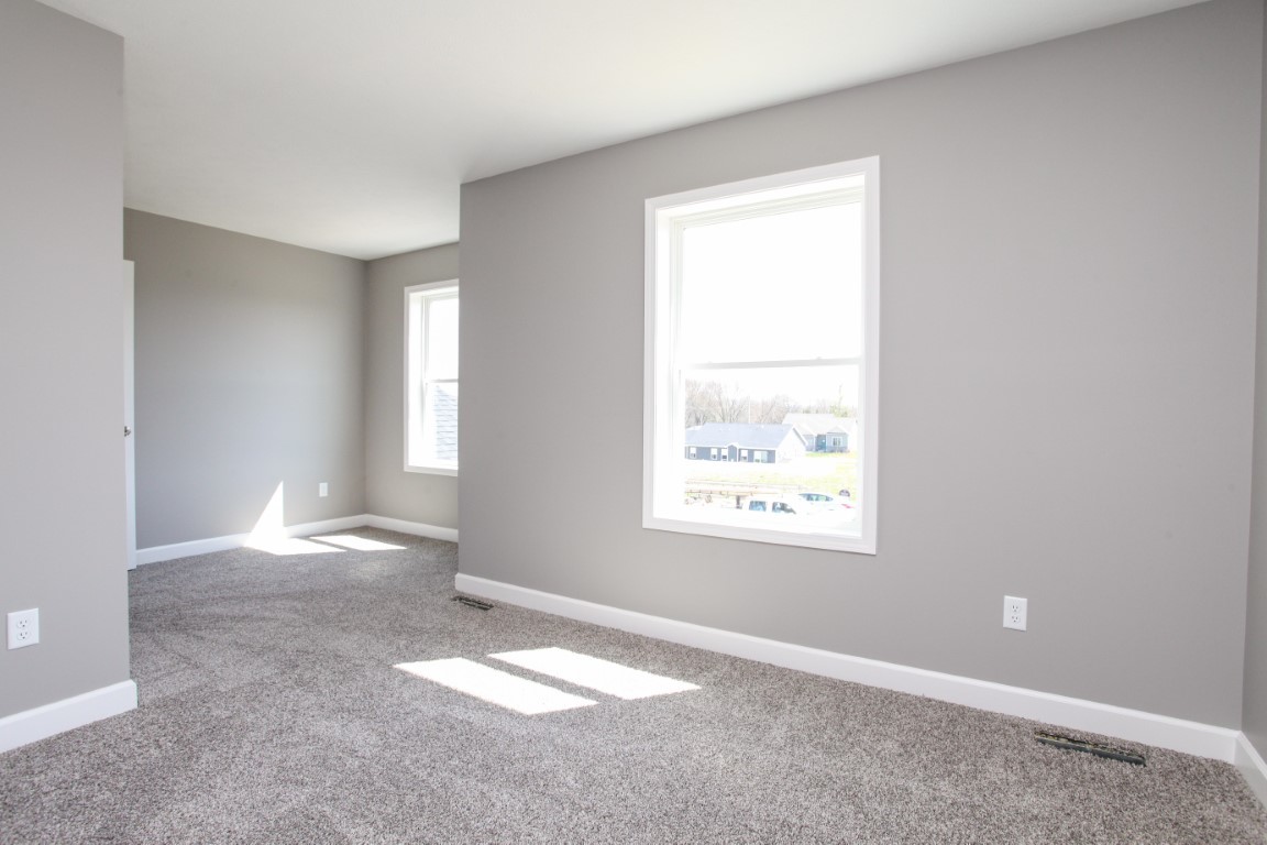 2238 Heather Ridge Drive Normal, IL 61761 - Photo 26 of 26 an empty room with windows