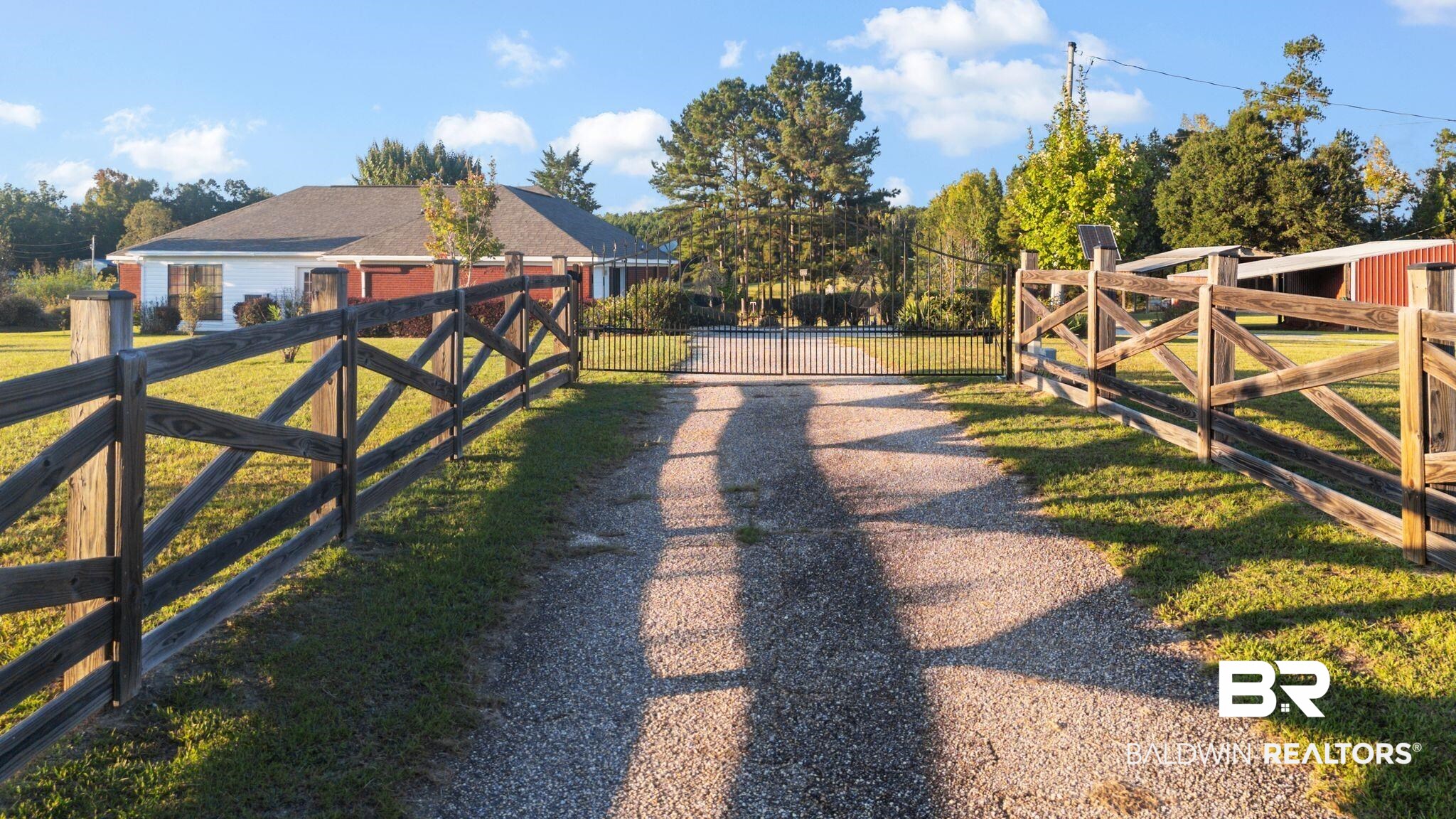 888 Mobile Cut-Off Road St. Stephens, AL 36569 - Photo 4 of 54 View of yard with a gate