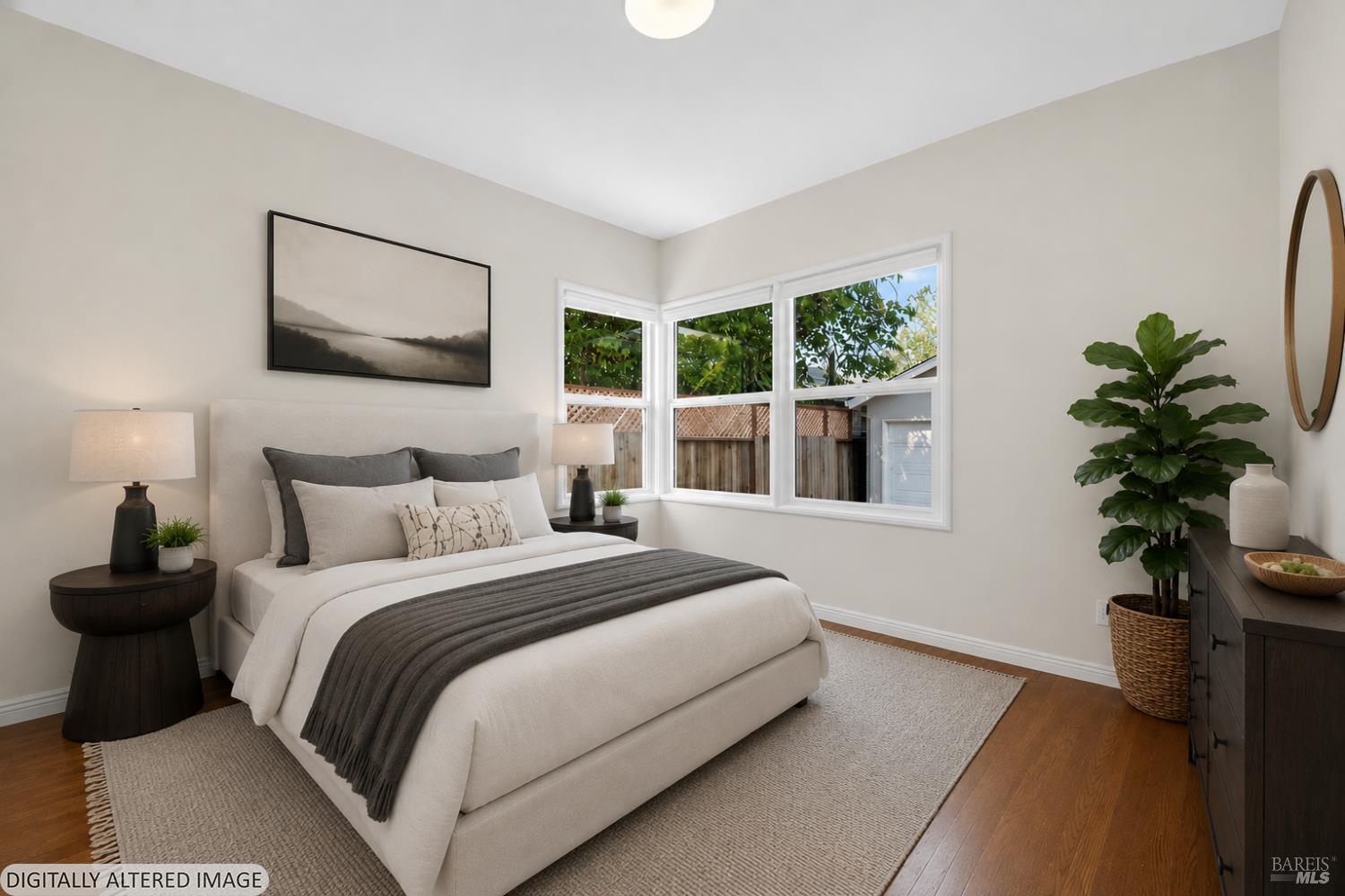 2211 Humboldt Street Santa Rosa, CA 95404 - Photo 23 of 52 a bedroom with a large bed and a potted plant