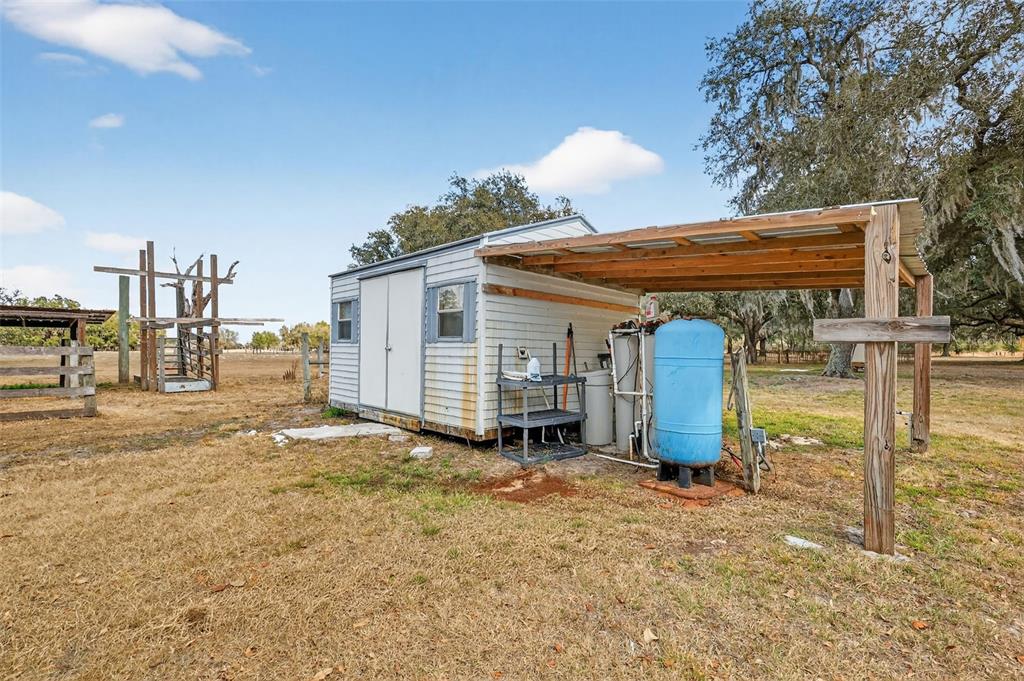 4533 Southwest 37th Terrace Bushnell, FL 33513 - Photo 45 of 58 a view of a house with backyard