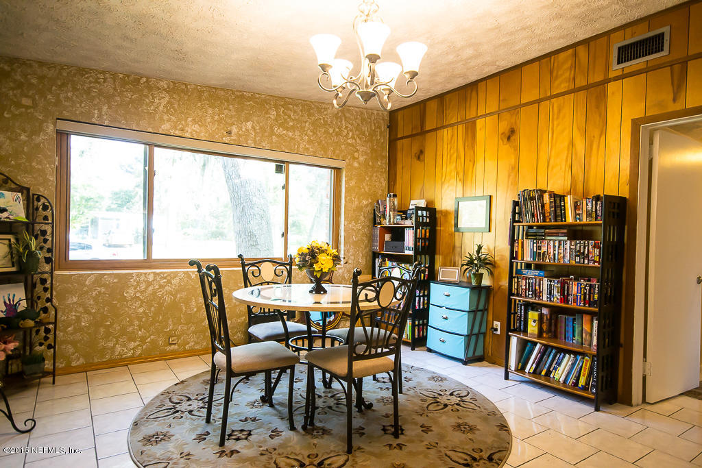 10504 Rutgers Road Jacksonville, FL 32218 - Photo 11 of 32 a view of a dining room with furniture window and outside view