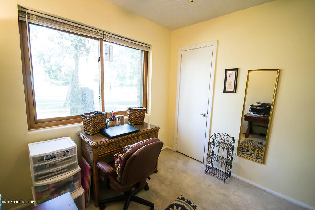 10504 Rutgers Road Jacksonville, FL 32218 - Photo 15 of 32 a dining room with furniture and window